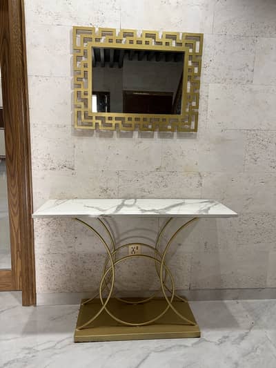 Golden console with mirrior