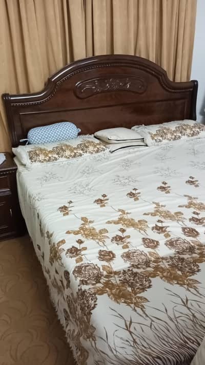 double bed with side tables and mattress