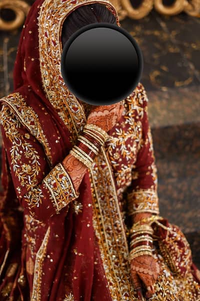 Regal Maroon Bridal Lehenga – Heavily Embroidered with Gold Work