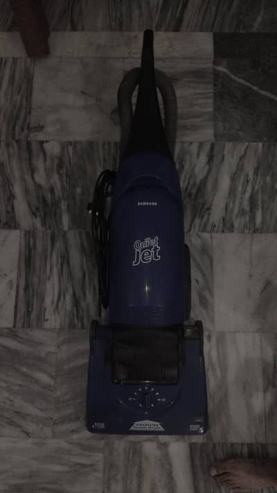 blue Samsung Quiet Jet 1400W Power Brush upright vacuum cleaner.