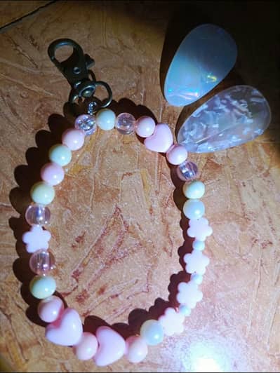 pinteresry pink and white beaded keychain with resin pins