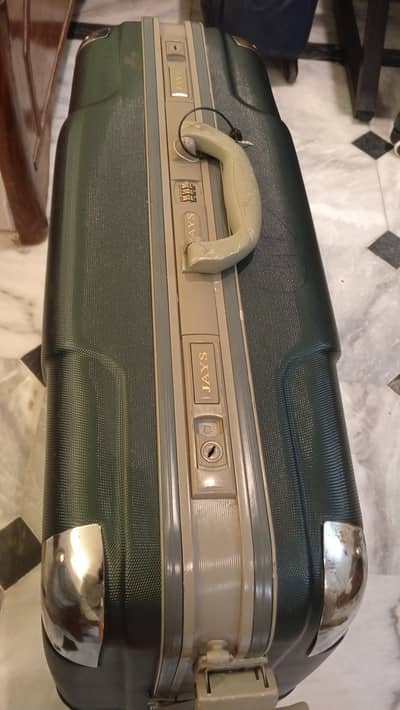 VIP luggage bag, a VIP suitcase, or a hardshell briefcase