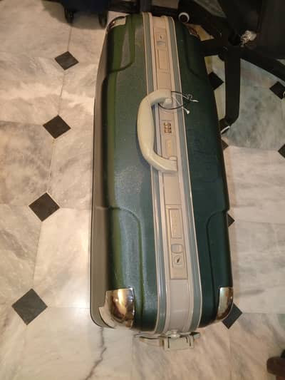 VIP luggage bag, a VIP suitcase, or a hardshell briefcase