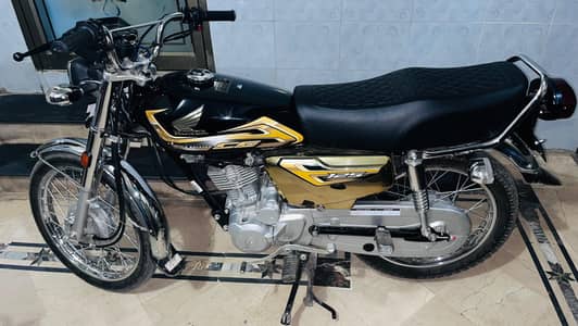 honda 125self start Golden color