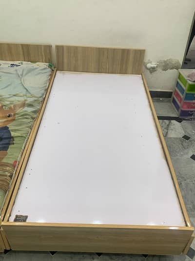 wooden 2 single bed