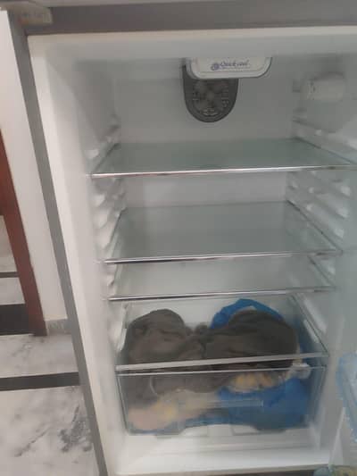 fridge refrigirator slitghly used condition is shown in the pics