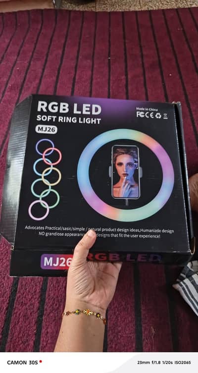 Ring light with triport