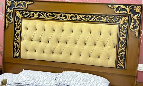 Bed with two side tables and dressing