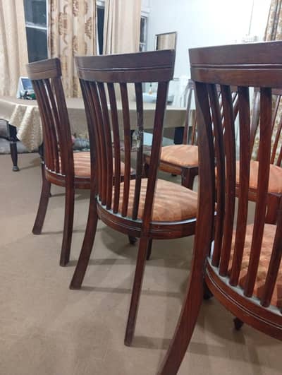 Dining table with 6 chairs and 2 songle beds