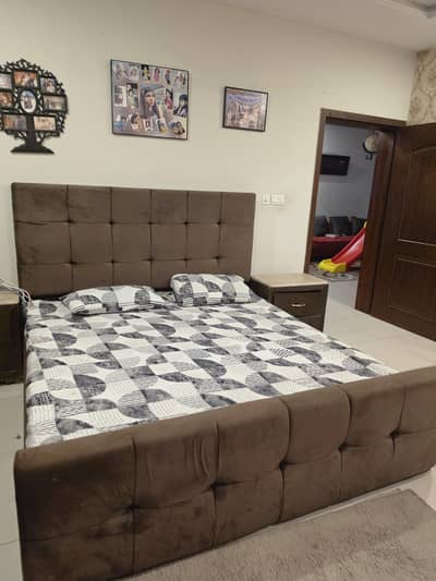 King Size bedroom along with 2 side tables and a dressing table