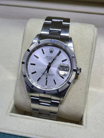 WATCH BUYER | Rolex Oyster Perpetual Date Ref. 15210 Tudor Omega Rado