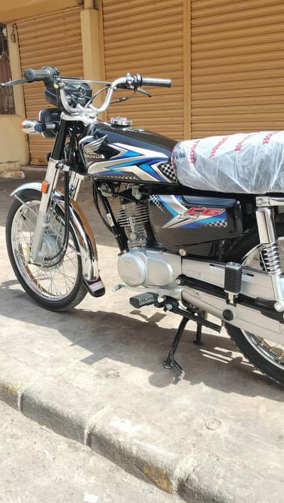 Honda CG-125. . . {2025} Karachi Number. . . . . 0303/0255582