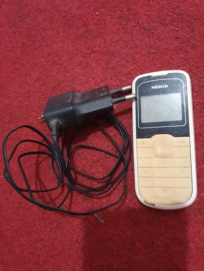 NOKIA 1202 M9BILE + ORIGINAL CHARGER ONLY 1000