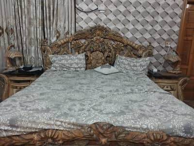 King size bed with dressing table and table lamps