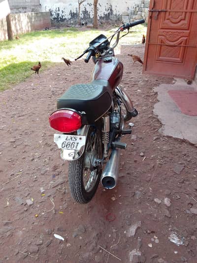 old is gold Honda 125 1979 model