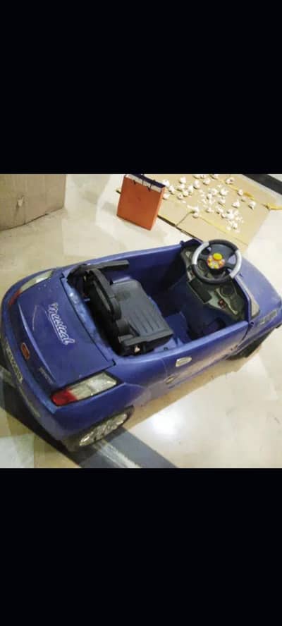 Battery Car for kids up to 12 years age urgent to sell