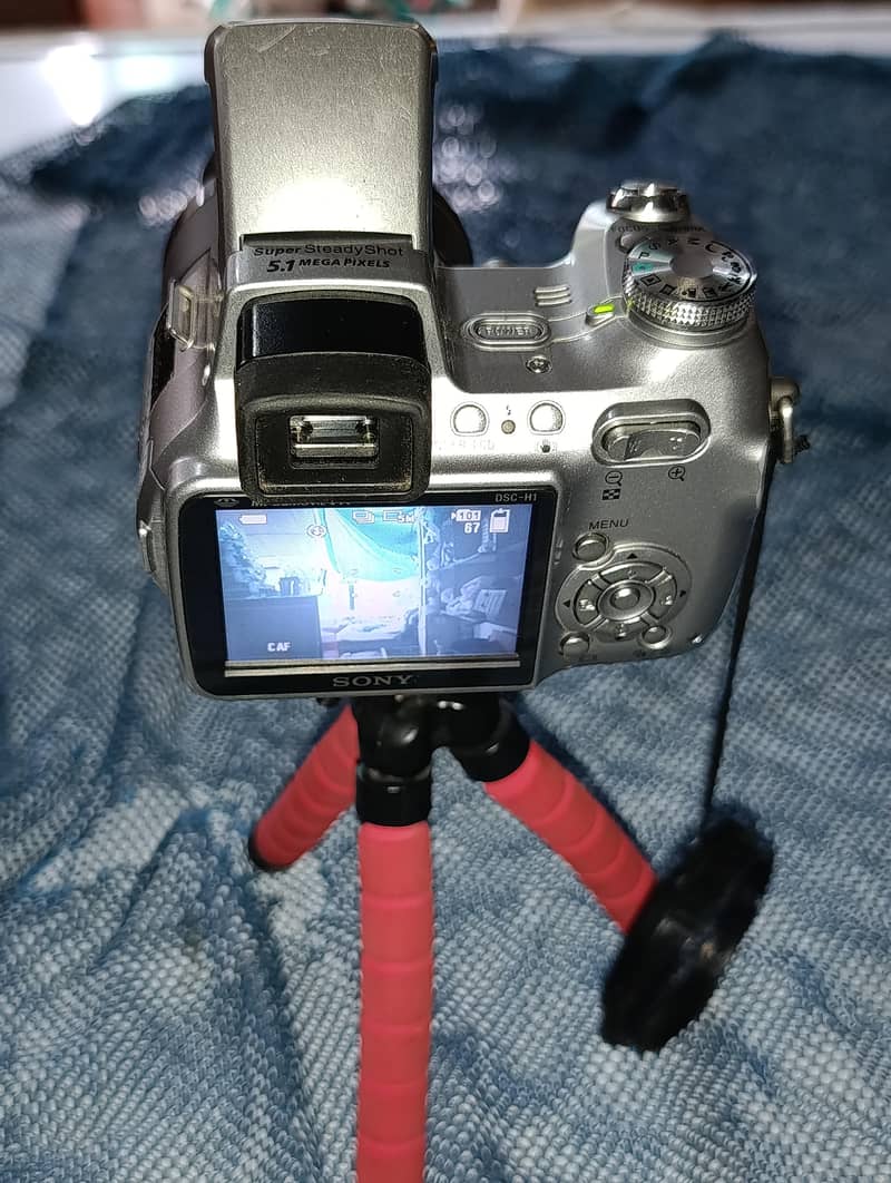 “Digital Camera With 2 Batteries” 3
