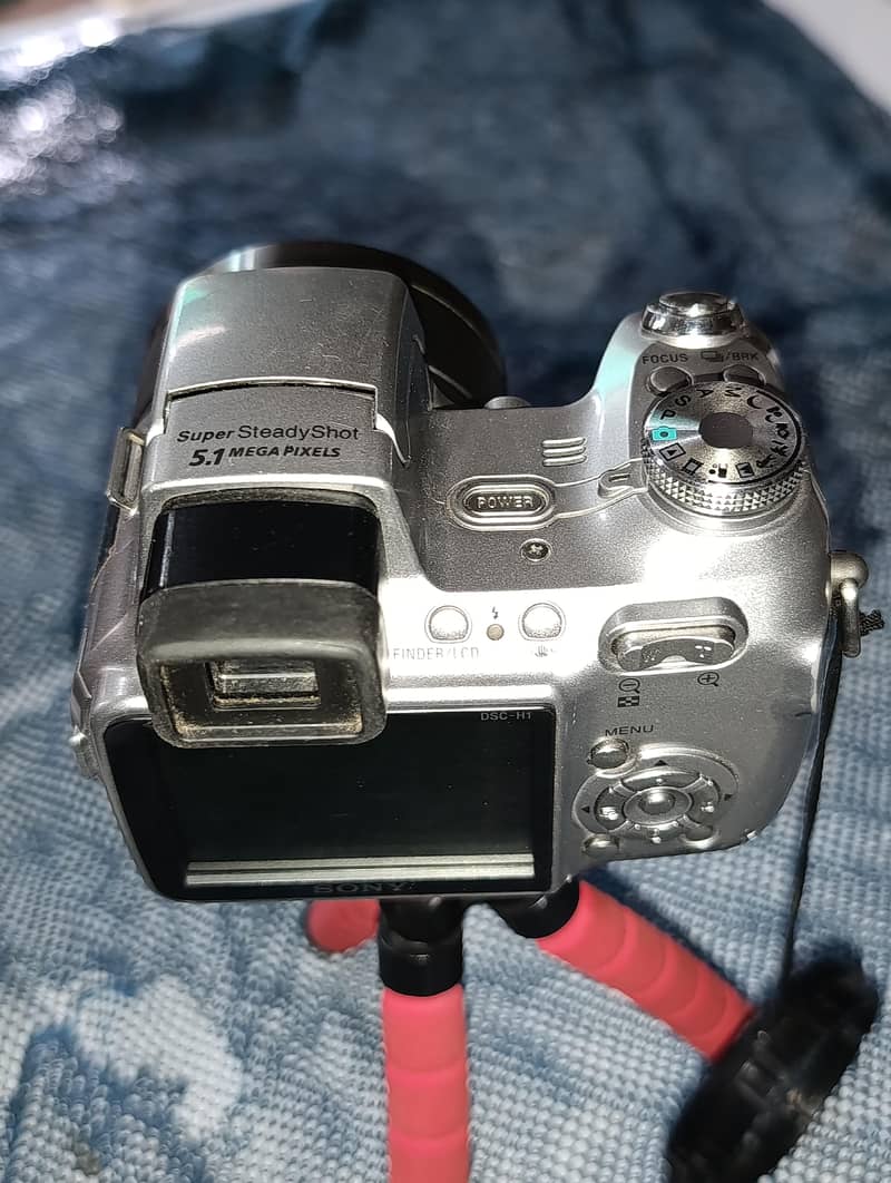 “Digital Camera With 2 Batteries” 4