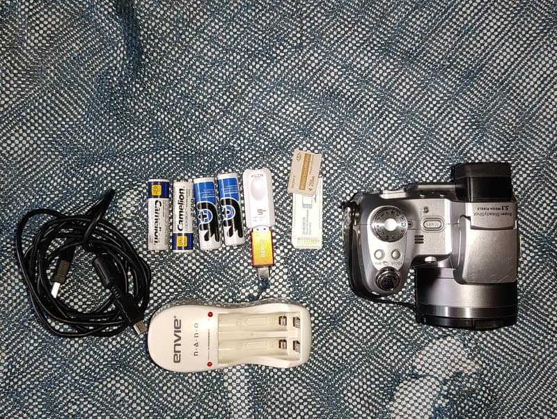 “Digital Camera With 2 Batteries” 7
