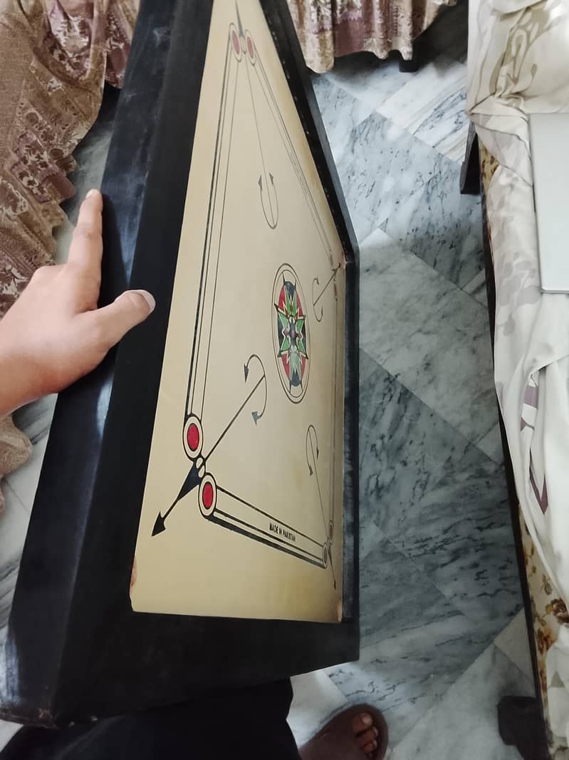 carrom board.  no bargaining. . final rate 9450 3