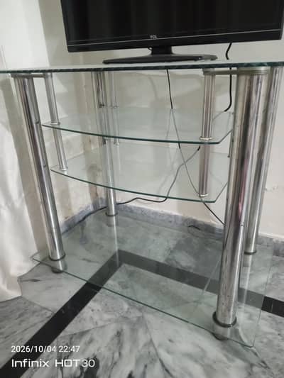 Tv console glass table almost new in condition