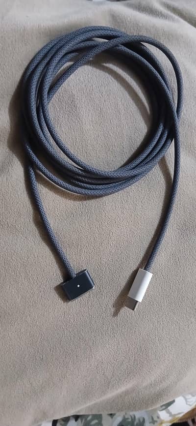 Apple USB-C to MagSafe 3 Cable (2m) in a dark shade