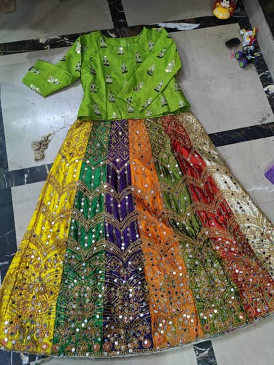 silk lehnga with choli and net dupatta
