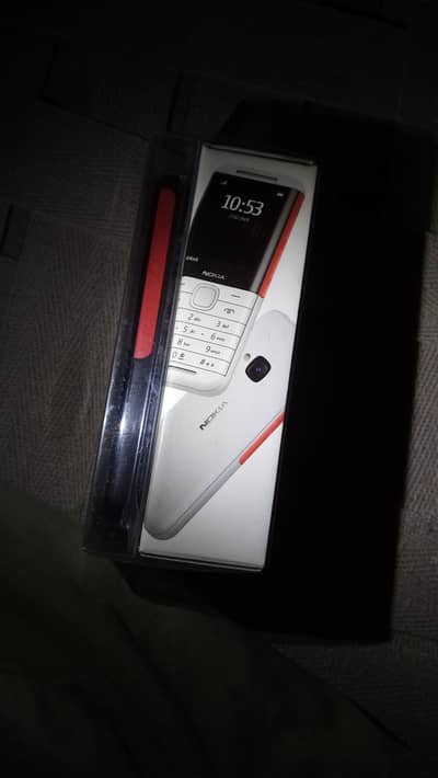Nokia 5310 duall sim box charger 10 by 9.5