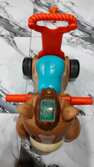 fisher price ride on car