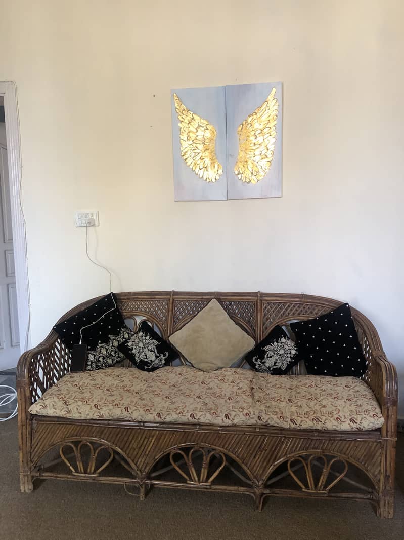 4 seater cane sofa 0