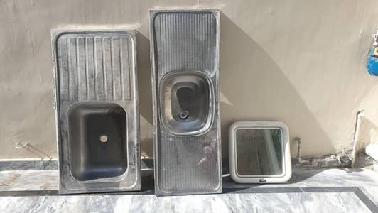 Kitchen Sinks and looking Mirror