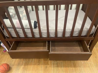 wooden baby bed with mattress and 3 complete bedding sets