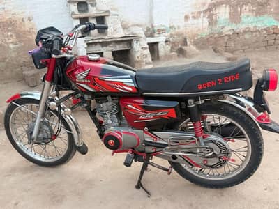 Honda 125 Peshawar number plate and double Saman