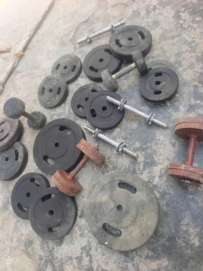 plates and dumbles for sale bilkul fresh plates aik dafa b nhi use