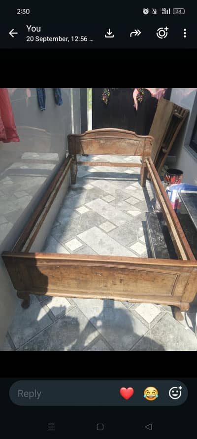 wooden single bed