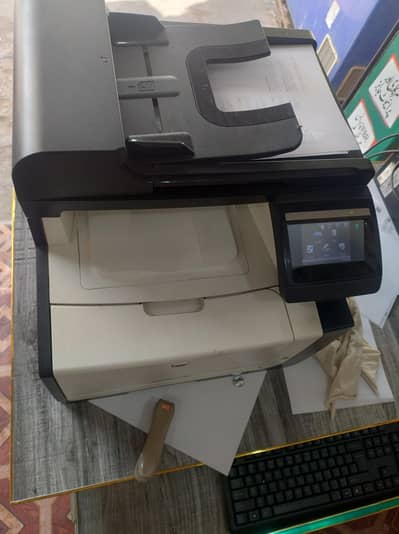 HP LaserJet CM1415fn All-in-One Printer
