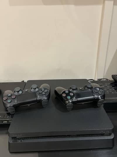 PlayStation 4 Slim 500 GB with 2 controllers