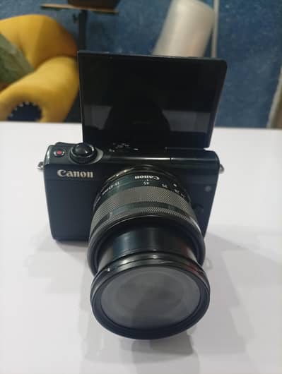 Canon M100