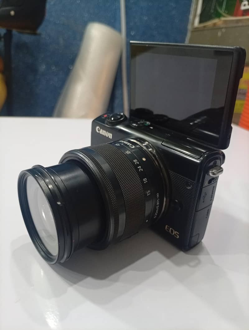 Canon M100 4