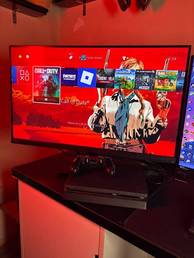 PS4 SLIM 500GB WITH ALOT OF GAMES