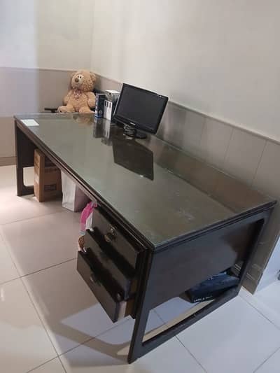 Office executive table with glass top for sale. L: 6ft, W: 3ft & H: 2