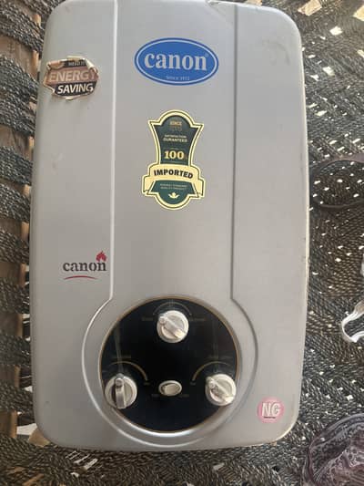 Canon CA - 16D plus instant water geyser brand new a bit used