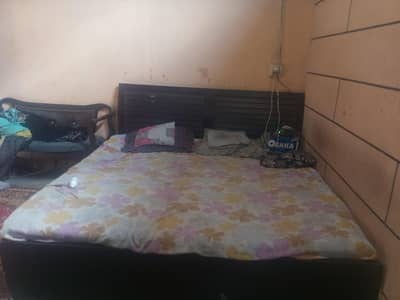 wooden double bed normal conditions
