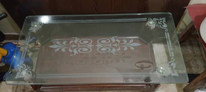 Wood table with printed glass