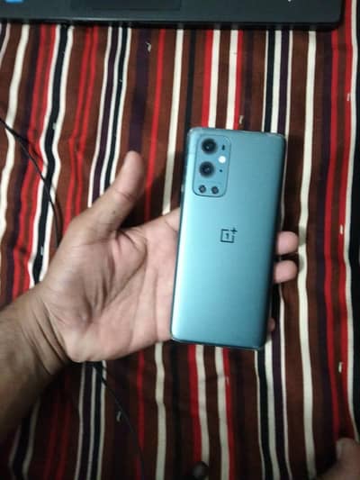 One Plus 9 Pro single sim approved 12 gb 256 gb back break no dot shad