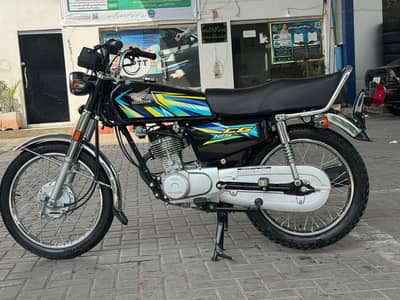 one hand use Honda 125 new condition all ok