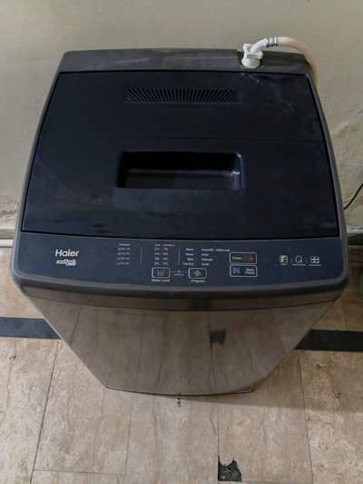 haier 9kg top load new machine only 2 time used warranty card