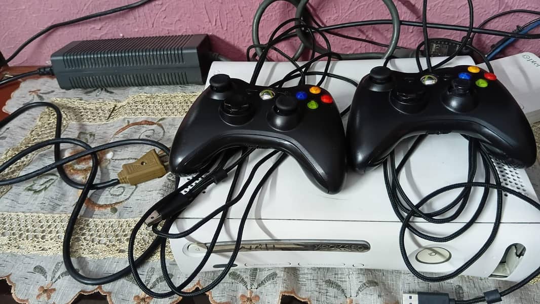 Xbox 360 with two controllers 7