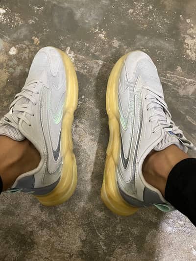 white color sports shoes