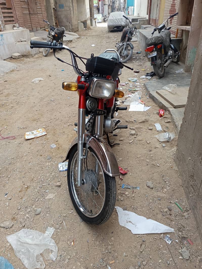 United 70cc 5